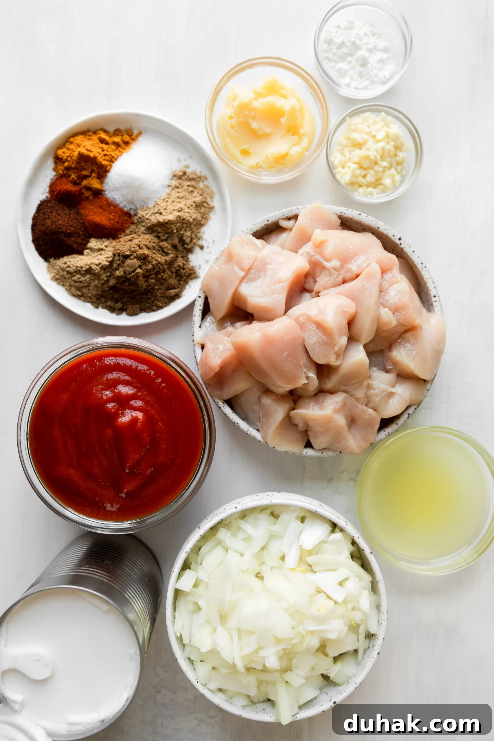 Chicken Tikka Masala Recipe: Light, Flavorful Weeknight Meal 3 glass bowls filled with recipe ingredients