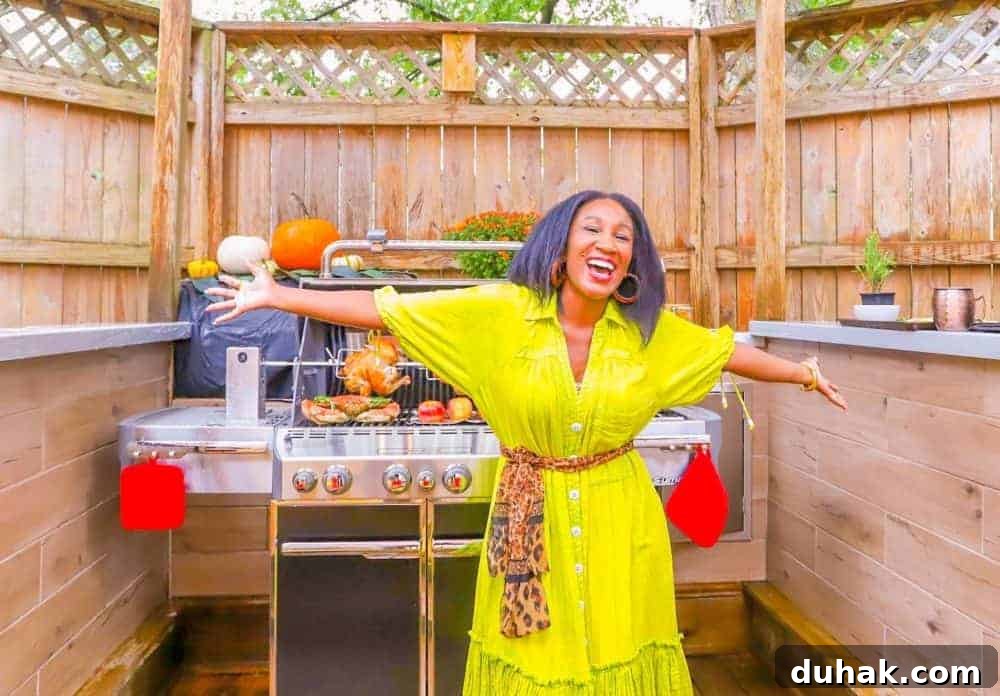 Top Modern Soul Food Recipes You’ll Love 4 Shaunda Necole embracing modern soul food cooking outdoors at the grill, reflecting The Soul Food Pot® Make-It-Your-Way philosophy — honoring Black food traditions while celebrating today’s creative, versatile kitchens.