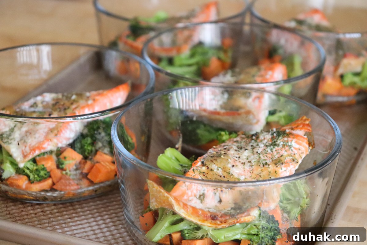Maple-Glazed Salmon Bowls with Rice and Greens 5 Five maple Dijon salmon meal prep bowls ready for the week