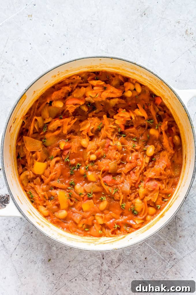Chakalaka: Traditional South African Spicy Vegetable Relish (Vegan, Gluten-Free) 9 overhead view of chakalaka recipe in white pot on countertop