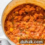 closeup of cooked chakalaka in large white pot
