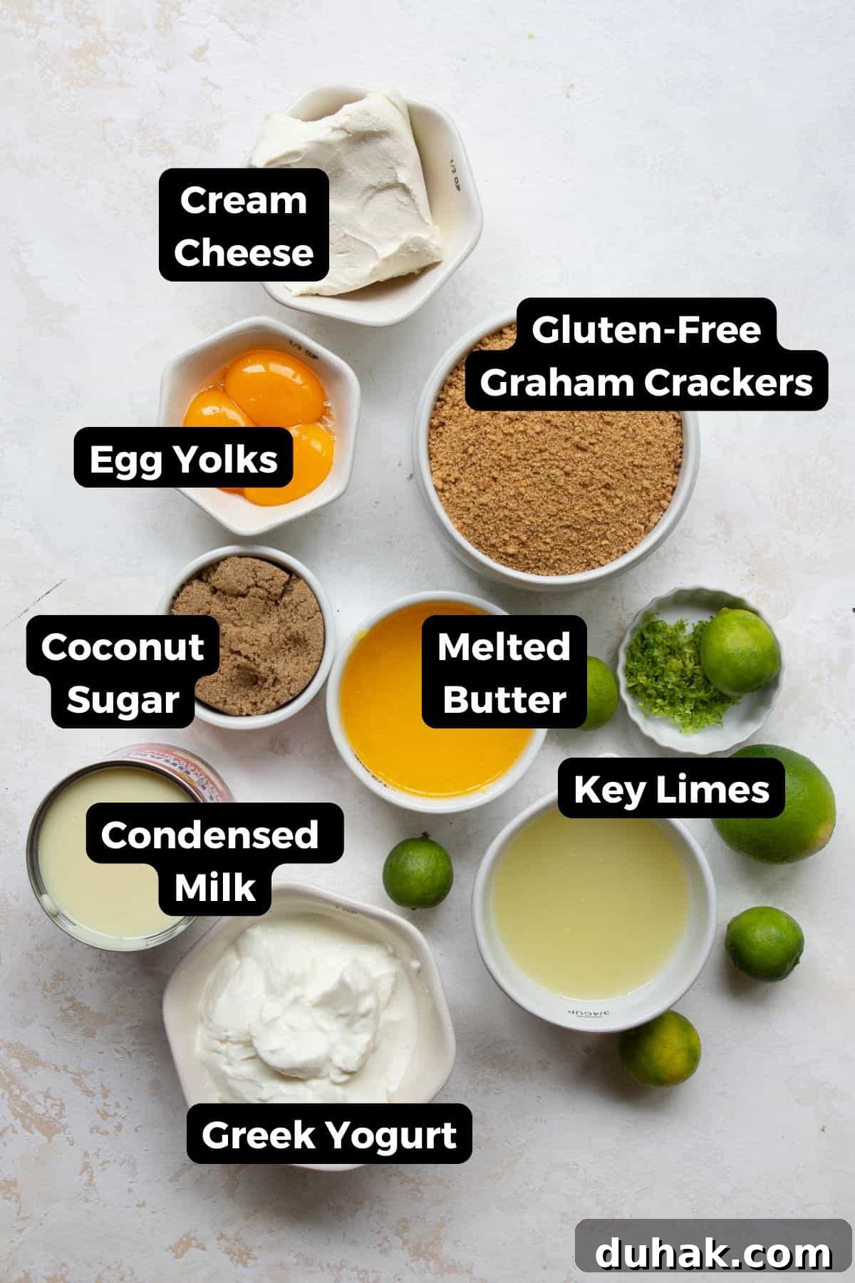 Key Lime Pie (Gluten-Free) — Zesty Citrus Dessert Recipe 3 All ingredients in gluten-free key lime pie including: gluten-free graham crackers, cream cheese, greek yogurt, key limes, coconut sugar, egg yolks, melted butter, and condensed milk.