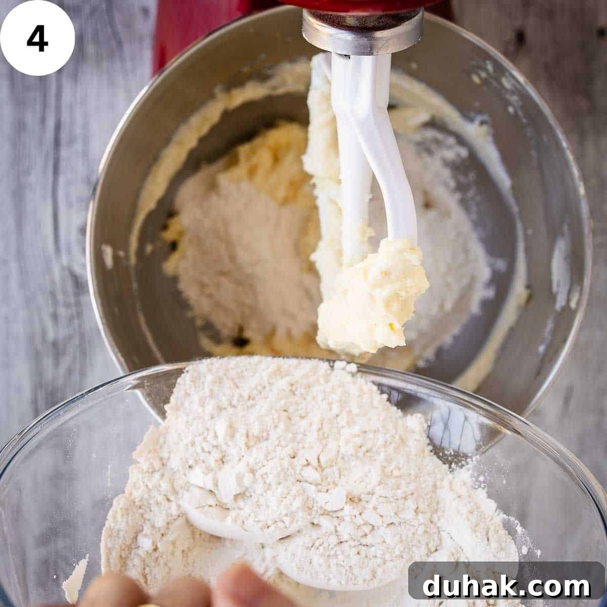 Lemon Ricotta Cookies Recipe — Soft, Zesty Citrus Cookies 7 Adding flour to creamy mixture in a stand mixer.