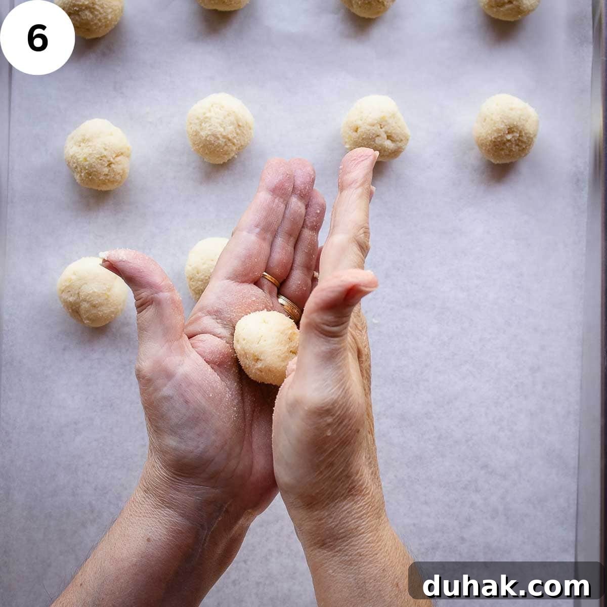 Lemon Ricotta Cookies Recipe — Soft, Zesty Citrus Cookies 9 Rolling cookie dough between palms.