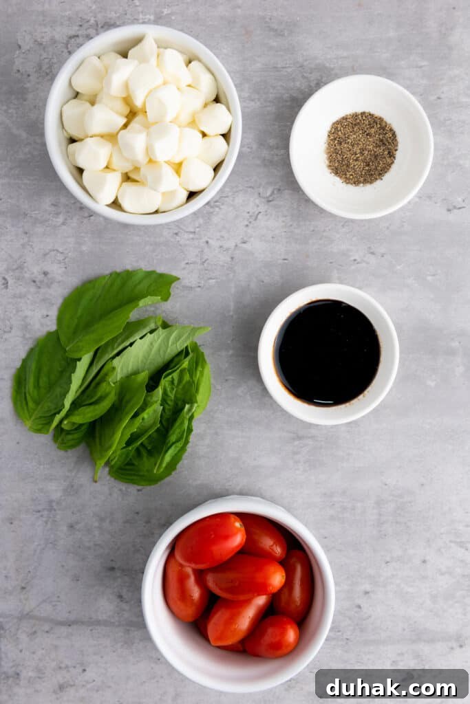 Caprese Skewers Recipe: Cherry Tomato, Mozzarella & Basil Bites 3 caprese skewers ingredients