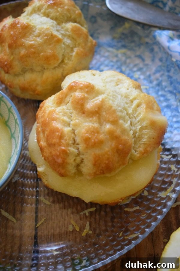 Lemon Cream Cheese Danish Recipe: Flaky Pastry with Zesty Filling 24 lemon curd filled scones on a plate