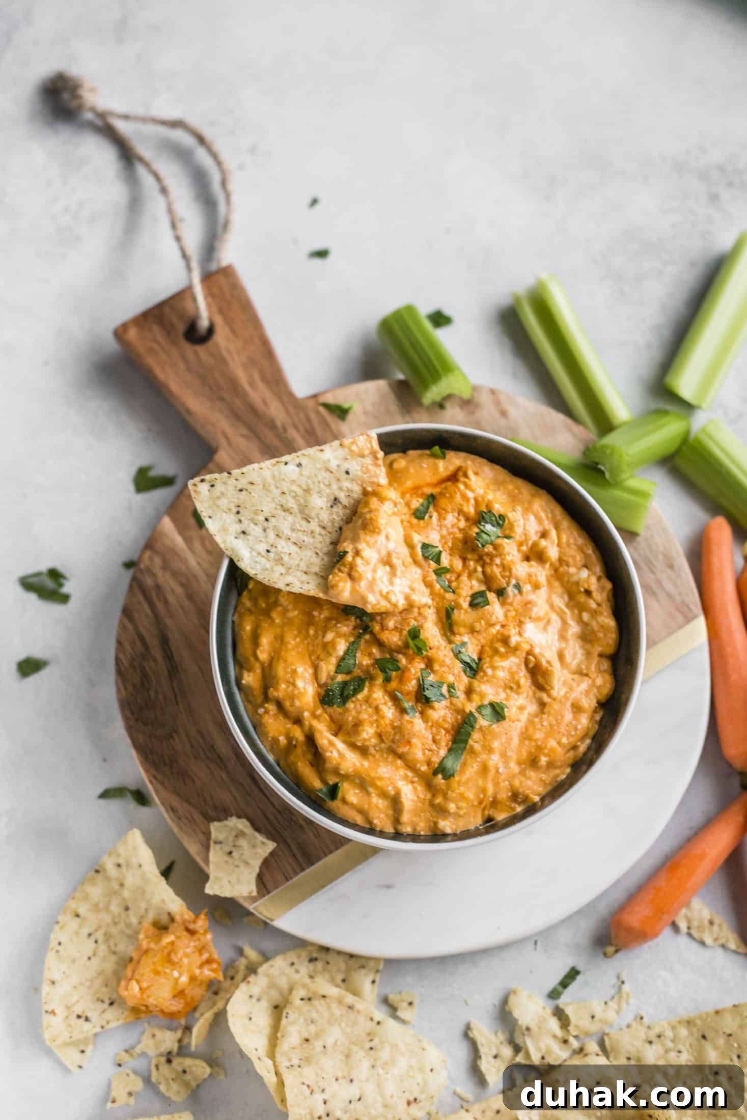 This is the best buffalo chicken dip recipe! Creamy, cheesy, slightly spicy and full of delicious chicken and flavors. Perfect for tailgating, football games, parties and weekends. This recipe is classic and super easy to make. I howsweeteats.com #buffalo #chicken #dip #recipe