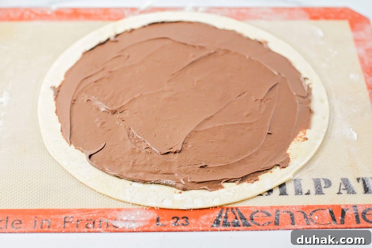Nutella spread on puff pastry.