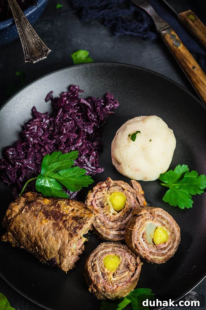 Sliced rouladen with bacon, onion, and pickles.