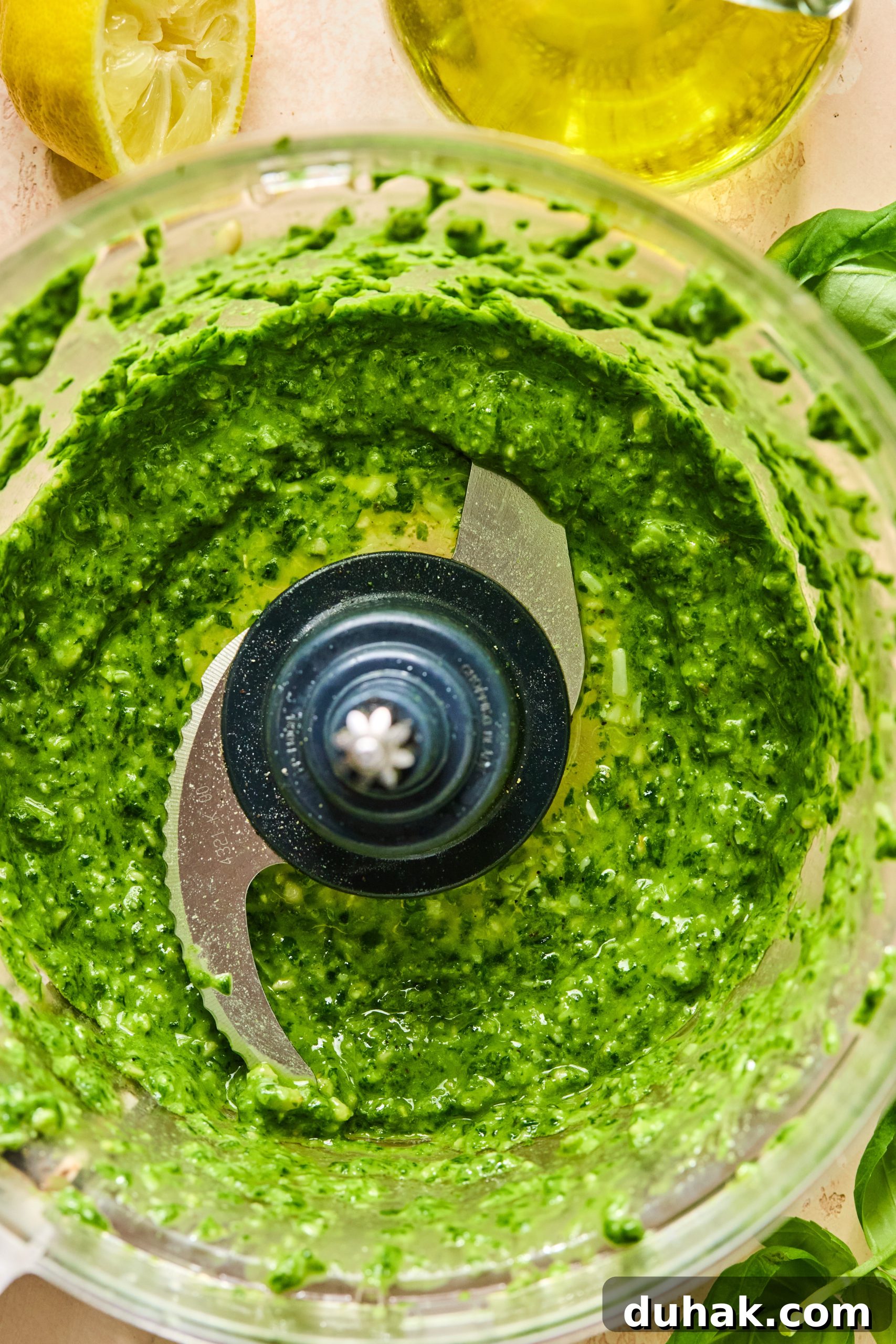 Asparagus and Sun-Dried Tomato Stuffed Chicken with Pesto and Cheese 5 A food processor filled with homemade spinach pesto