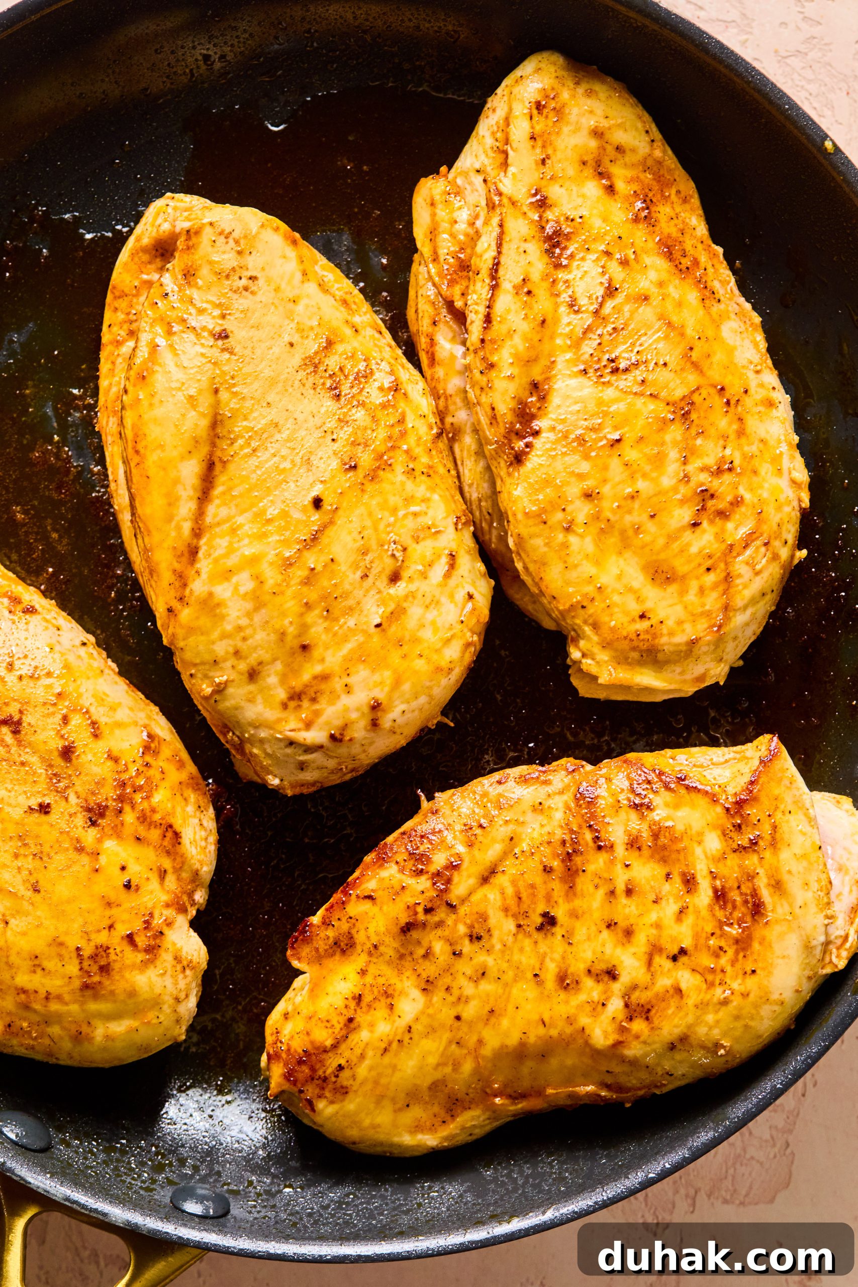 Asparagus and Sun-Dried Tomato Stuffed Chicken with Pesto and Cheese 8 Seasoned chicken breasts seared in a large skillet
