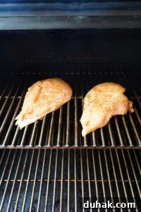 Transfer out to the smoker and place the chicken directly on the grates
