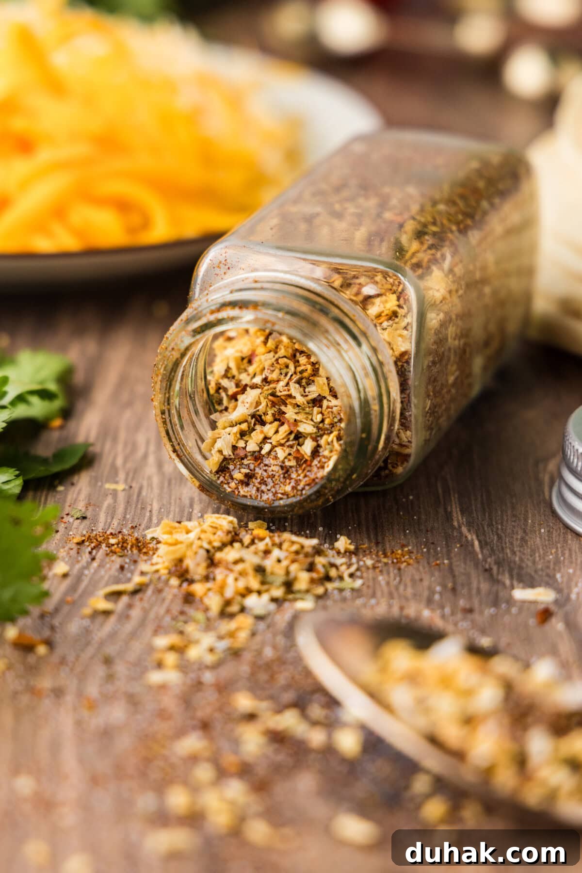 DIY Taco Seasoning Blend for Authentic Mexican Flavor 2 homemade taco seasoning in a jar that fell over and is spilling out