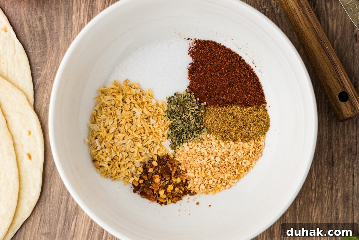 DIY Taco Seasoning Blend for Authentic Mexican Flavor 5 taco seasoning spices in a bowl