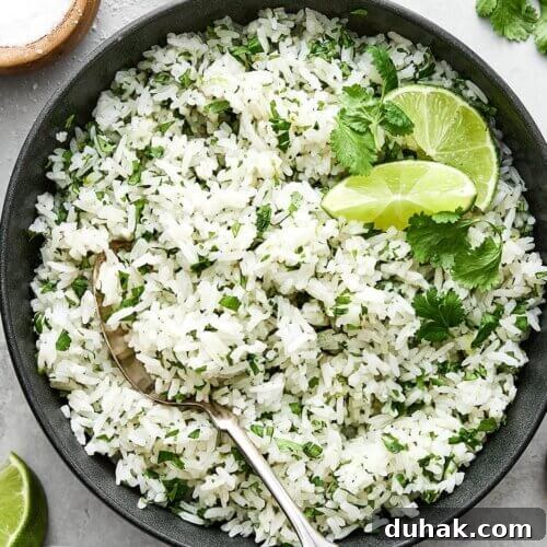 Cilantro lime rice with fresh limes.