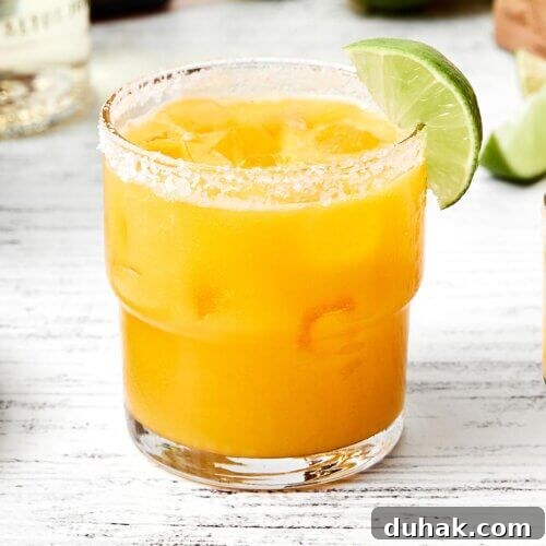 A glass of mango margarita.