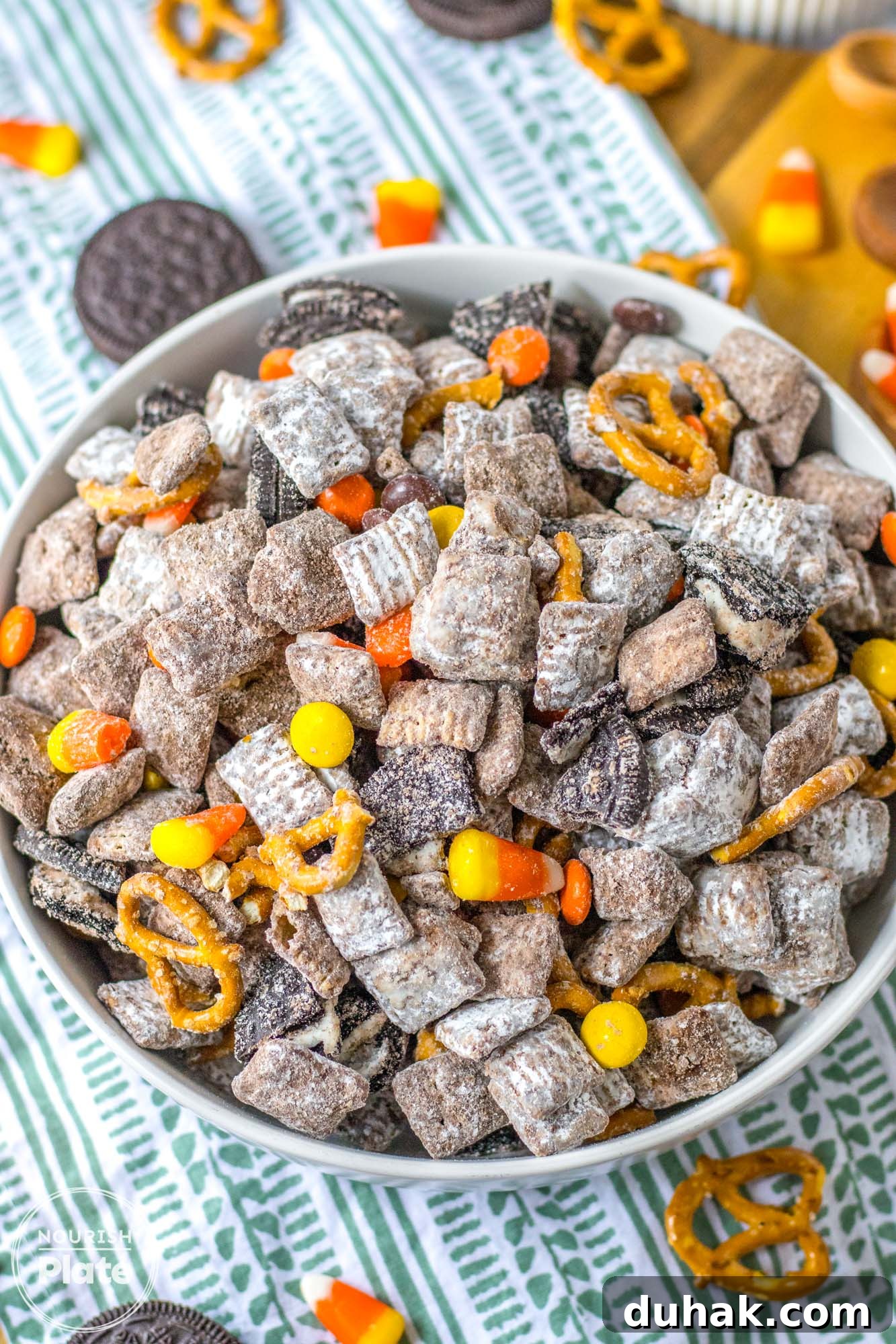 Autumn Puppy Chow Recipe: Seasonal Snack Mix for Fall 2 Fall puppy chow served in a large white bowl