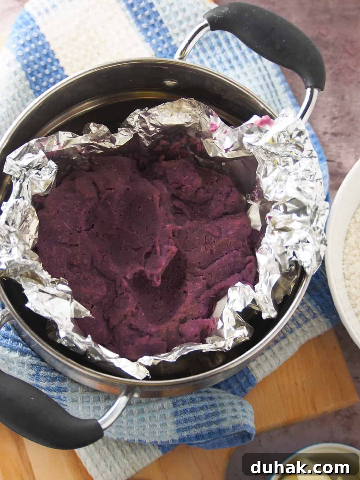 Ube Cheese Pandesal Recipe: Soft Filipino Purple Yam Rolls 3 mashed purple yam in a steamer.