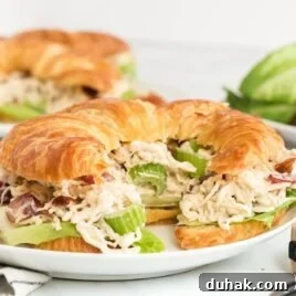 Smoky Texas Brisket Sandwich Recipe for Tender Pulled Beef 6 close up shot of a Chicken Salad Sandwich on a plate