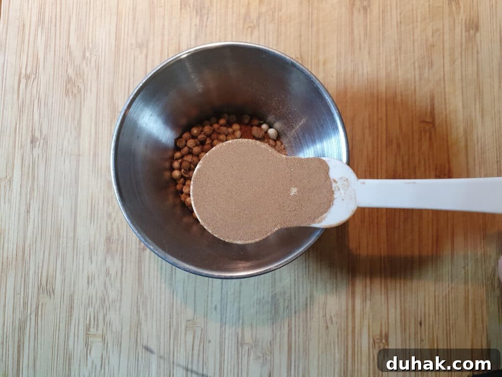 How to Make Homemade Cola Soda from Scratch 10 Measuring kola nut powder into a small bowl.