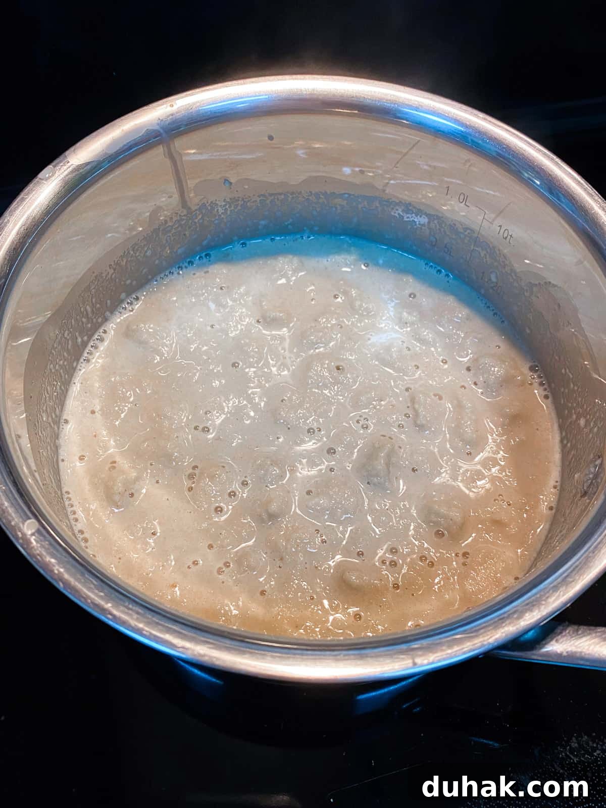 Photo of simmering bread sauce.