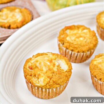 Keto Pumpkin Cream Cheese Swirl Muffins