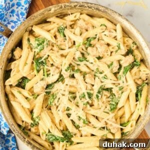 One-Pan Creamy Chicken and Spinach Pasta Skillet 2 close up of saucepan of finished dish