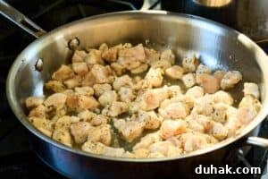 One-Pan Creamy Chicken and Spinach Pasta Skillet 4 chicken on stovetop