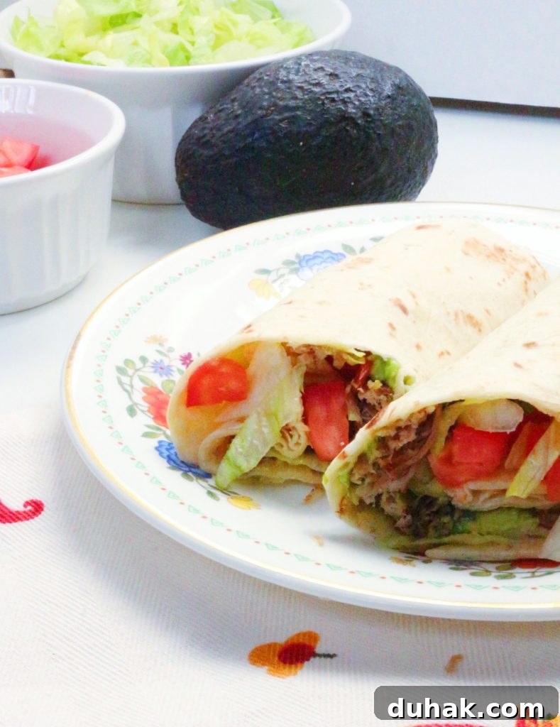 Everyday Shredded Pork and Avocado Burritos #porkburritos #mexicanfood #porkandavocadoburritos