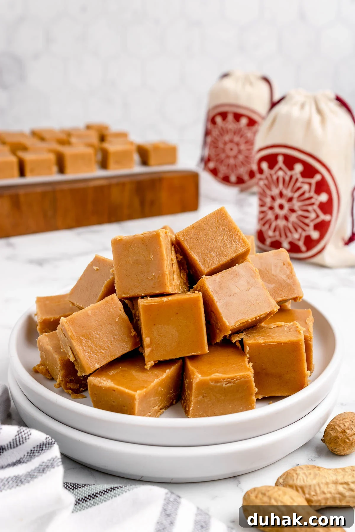 Peanut Butter Fudge with 2 Ingredients: Quick No-Bake Recipe 2 Pile of 2 ingredient peanut butter fudge on a plate