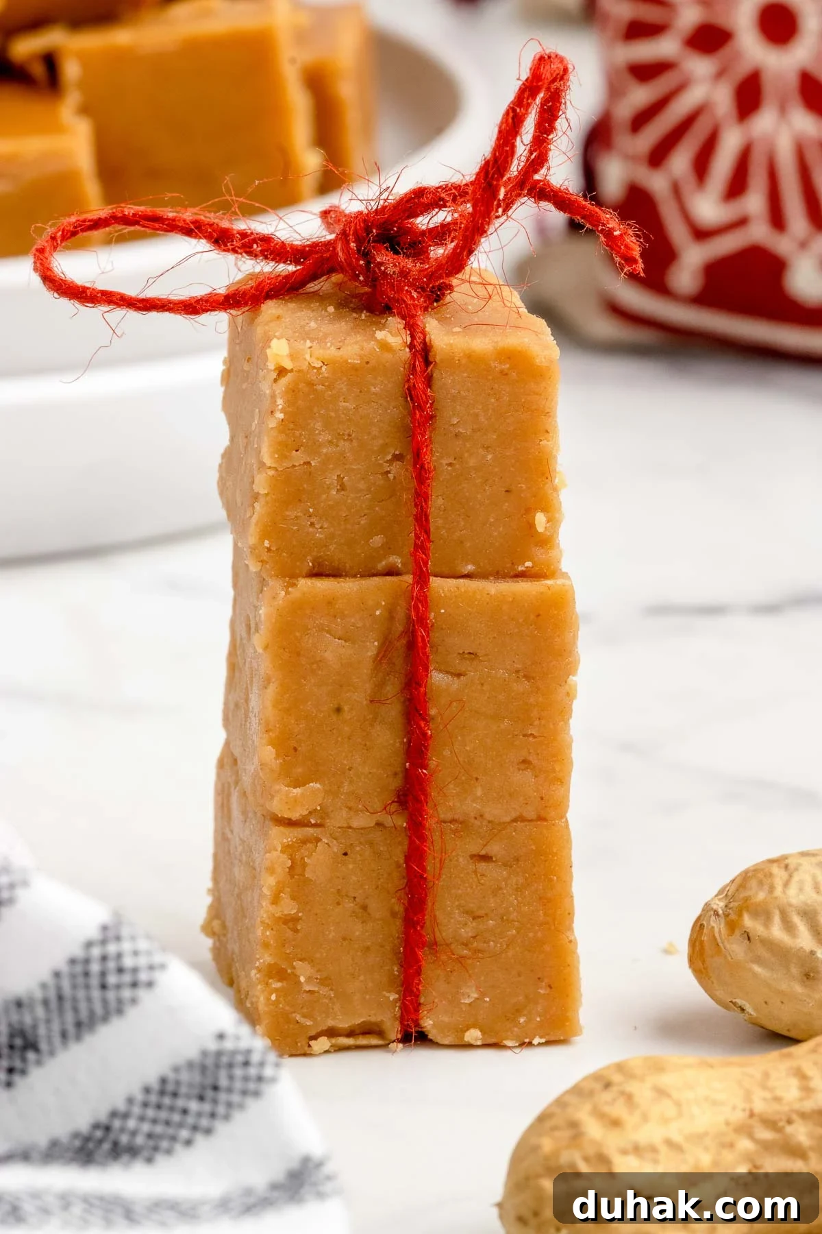 Peanut Butter Fudge with 2 Ingredients: Quick No-Bake Recipe 8 fudge wrapped in a holiday bow