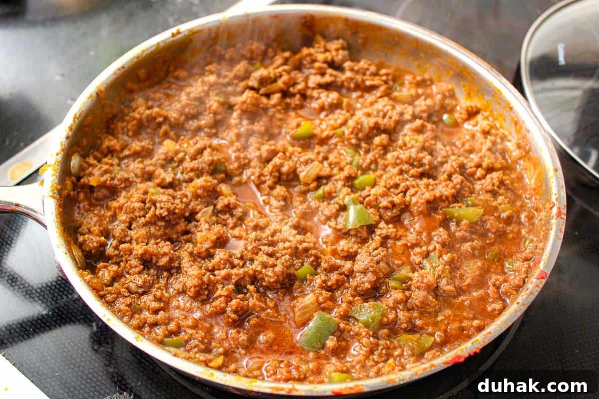 Classic Homemade Sloppy Joes Recipe for Perfect Weeknight Dinners 3 Ground beef for sloppy joe in skillet on stove