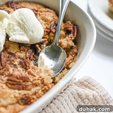 spoon in a pecan cobbler.