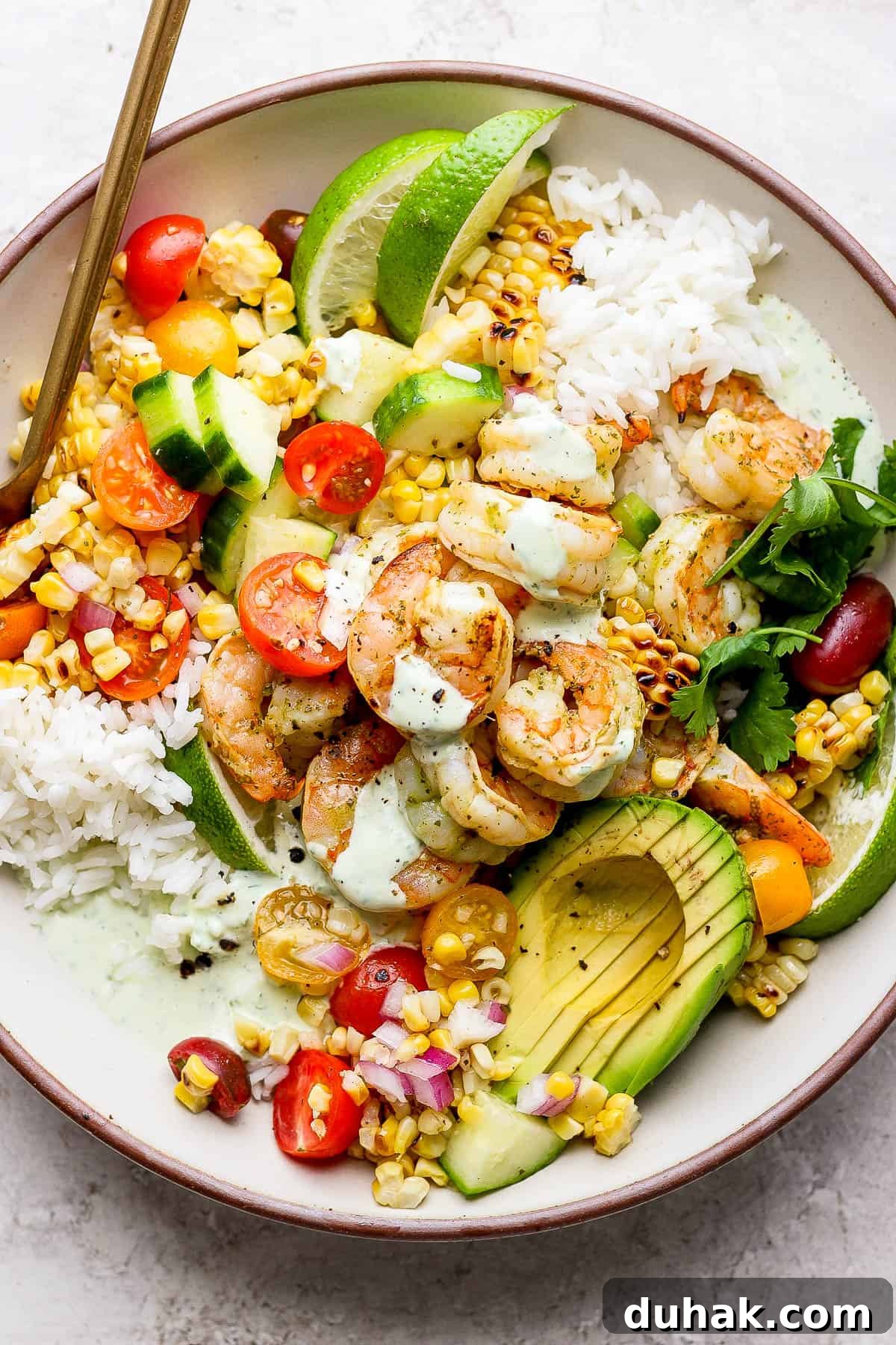 Cilantro-Lime Shrimp Bowl with Creamy Cilantro-Lime Sauce 2 The best recipe for a cilantro lime shrimp rice bowl.