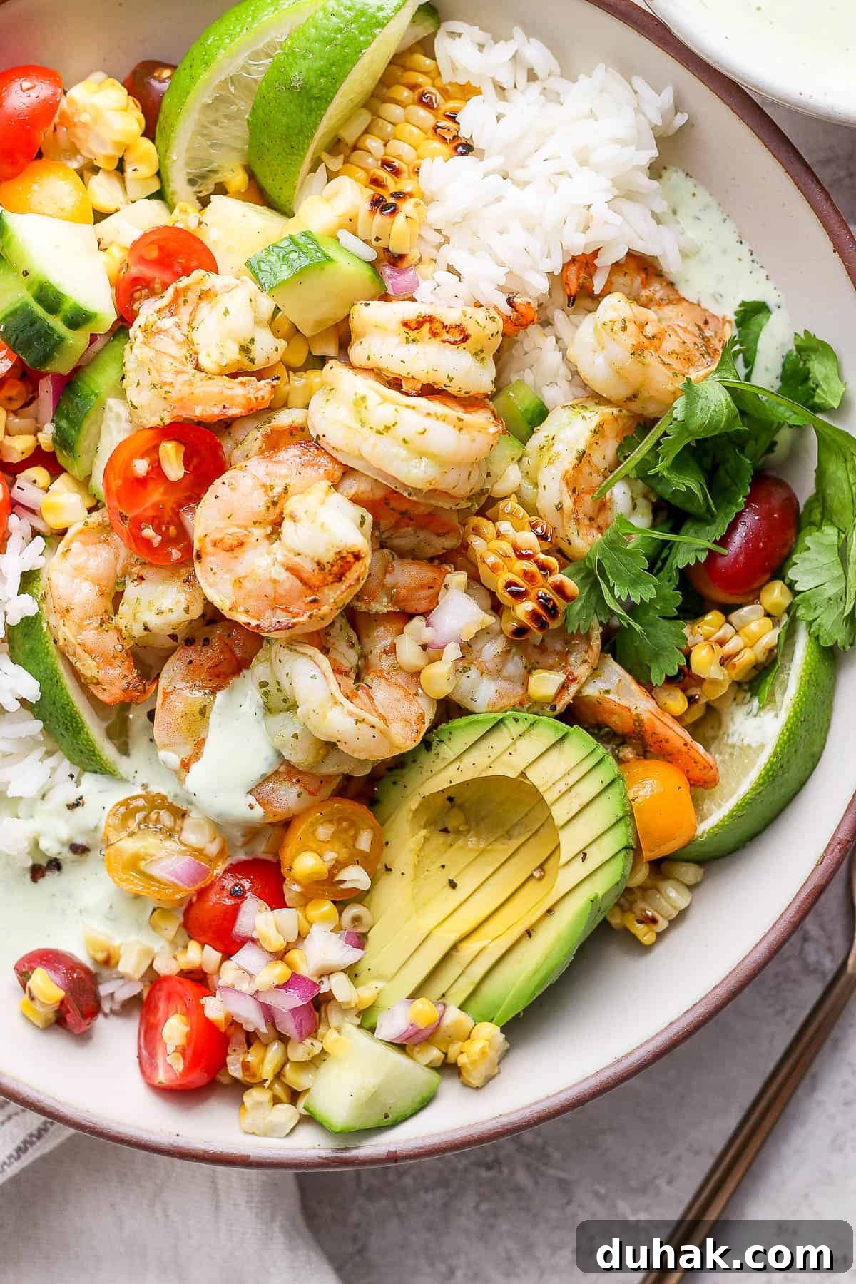 Cilantro-Lime Shrimp Bowl with Creamy Cilantro-Lime Sauce 8 An epic cilantro lime shrimp rice bowl.