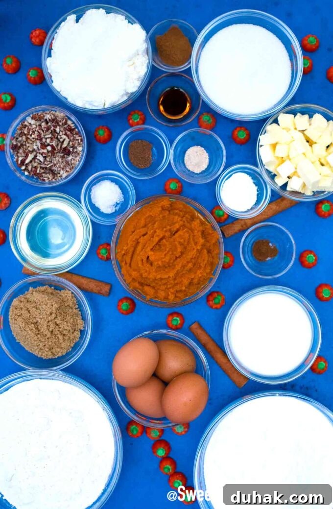 Pumpkin sheet cake ingredients in individual bowls.