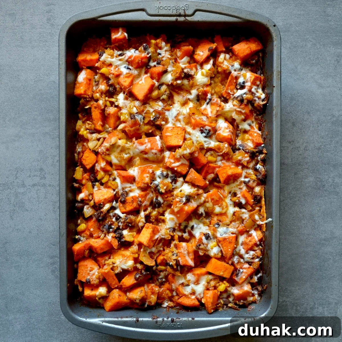Baked casserole with melted cheese