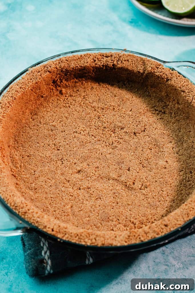 The baked crust in a 9-inch pie dish.