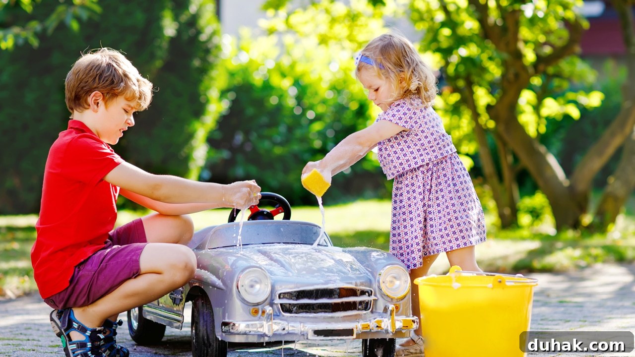 Let Kids Help: Safe Natural Cleaners for Family Cleaning 2 With Natural Cleaners, Kids Can Clean Too - children cleaning a toy car with soap and water