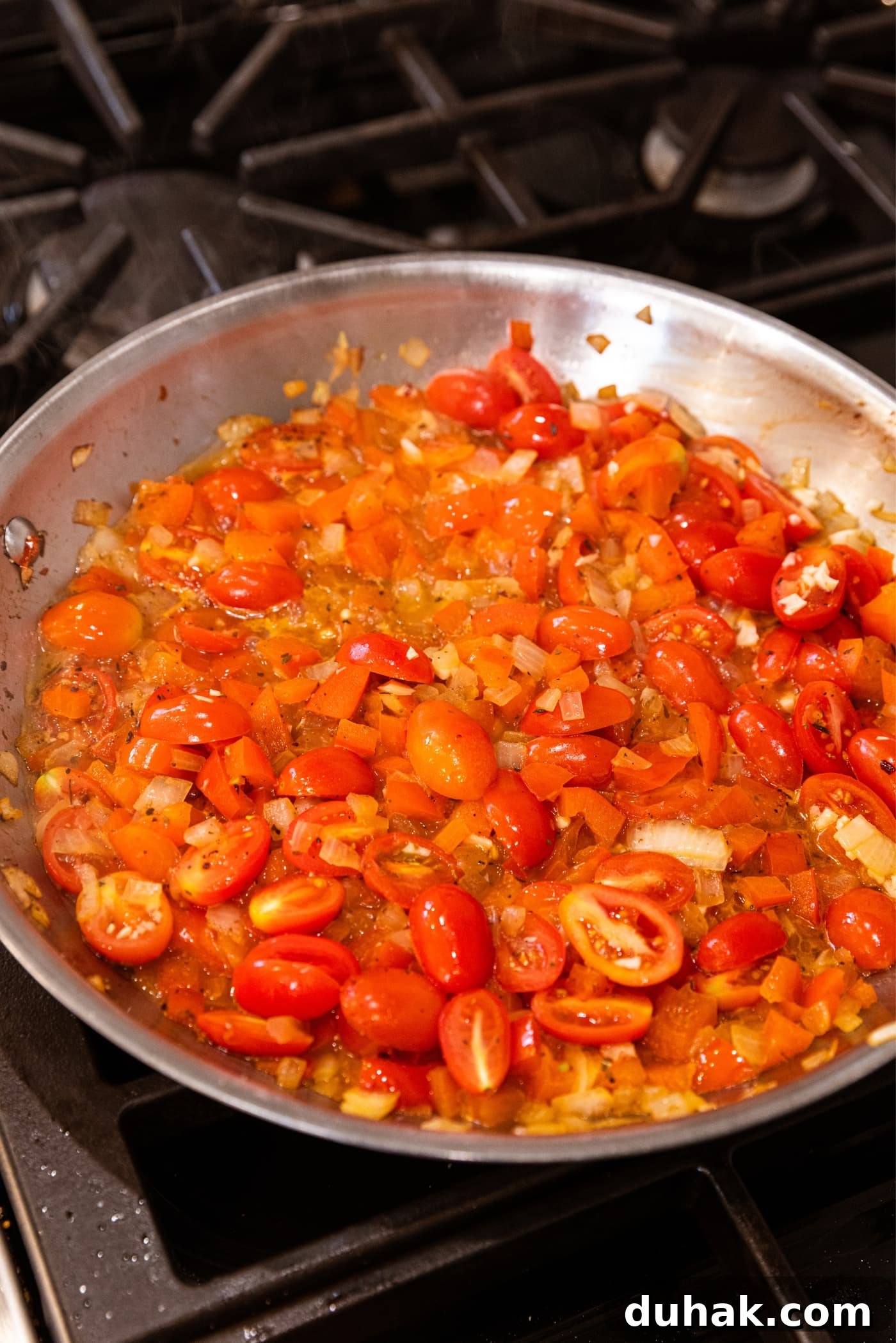 Cheesy Turkey & Spaghetti Squash Casserole Recipe 14 Simmer mixture of halved tomatoes with red bell pepper and onion in skillet on stovetop.