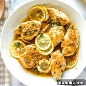 Cheesecake Factory Chicken Piccata Recipe: Copycat Instructions 7 Plated dish of lemon caper chicken cutlets.