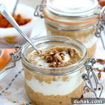 A lidded glass jar of pumpkin overnight oats.