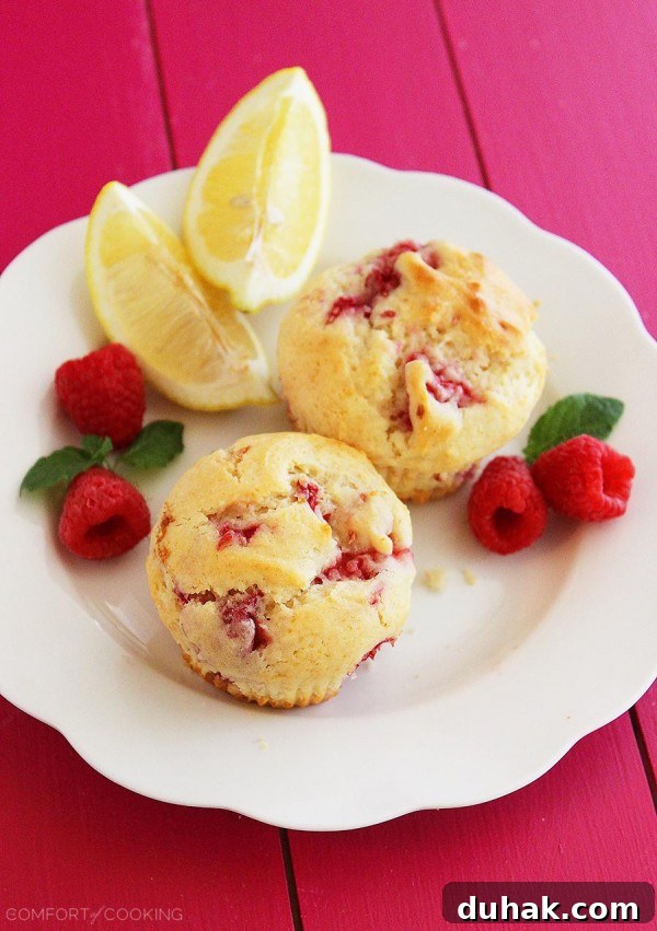 Super-Soft Lemon Raspberry Muffins Recipe for Moist, Zesty Bites 4 Super Soft Lemon-Raspberry Muffins – Wake up to a batch of these super soft, summery lemon raspberry muffins. They freeze and reheat easily, too! | thecomfortofcooking.com