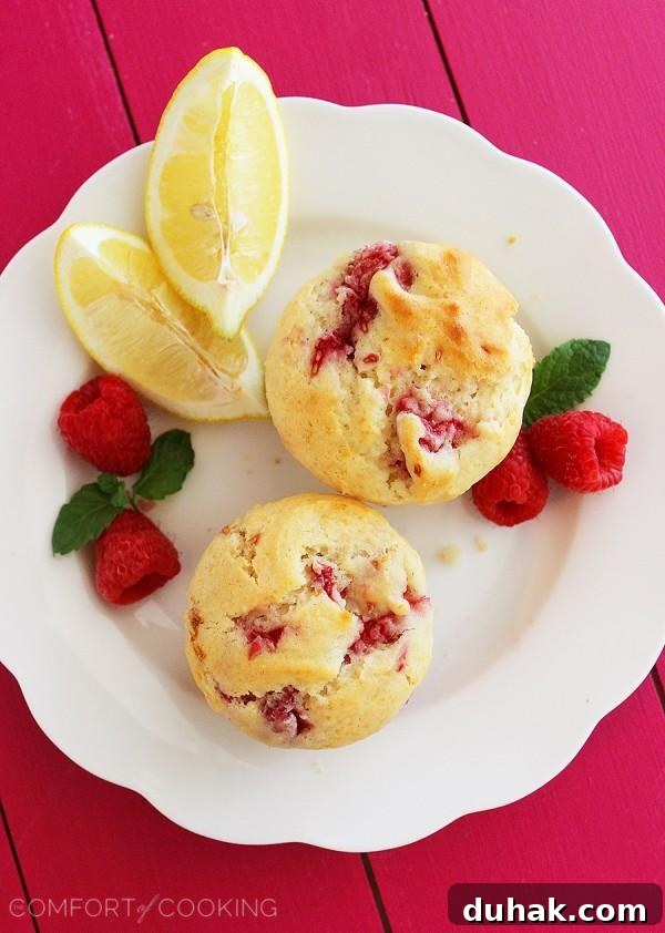 Super-Soft Lemon Raspberry Muffins Recipe for Moist, Zesty Bites 6 Super Soft Lemon-Raspberry Muffins – Wake up to a batch of these super soft, summery lemon raspberry muffins. They freeze and reheat easily, too! | thecomfortofcooking.com