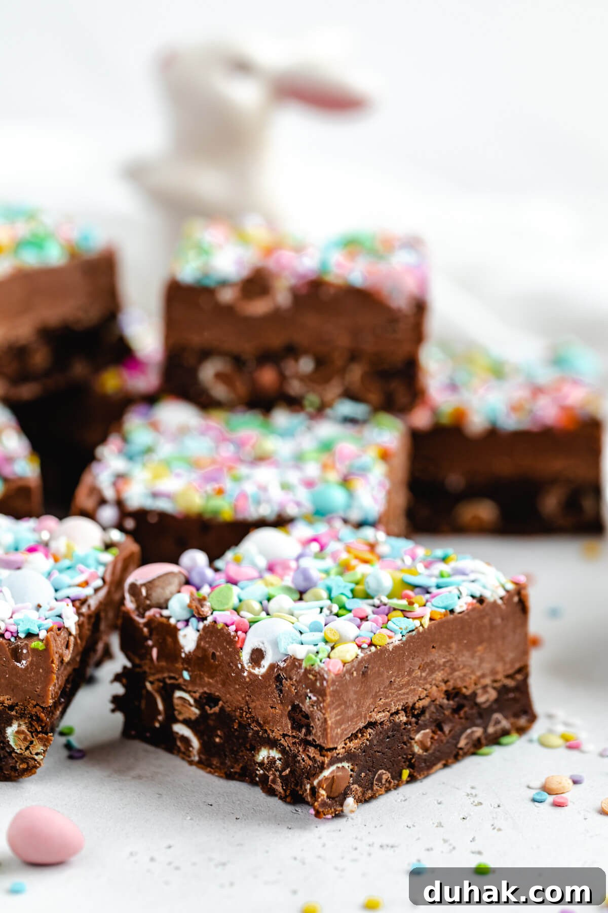 Malted Milk Chocolate Easter Egg Fudge Brownies Recipe 3 close up of brownie topped with fudge and sprinkles