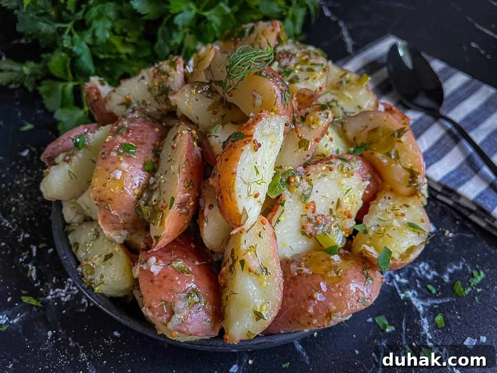 Herb potato salad on a plate.