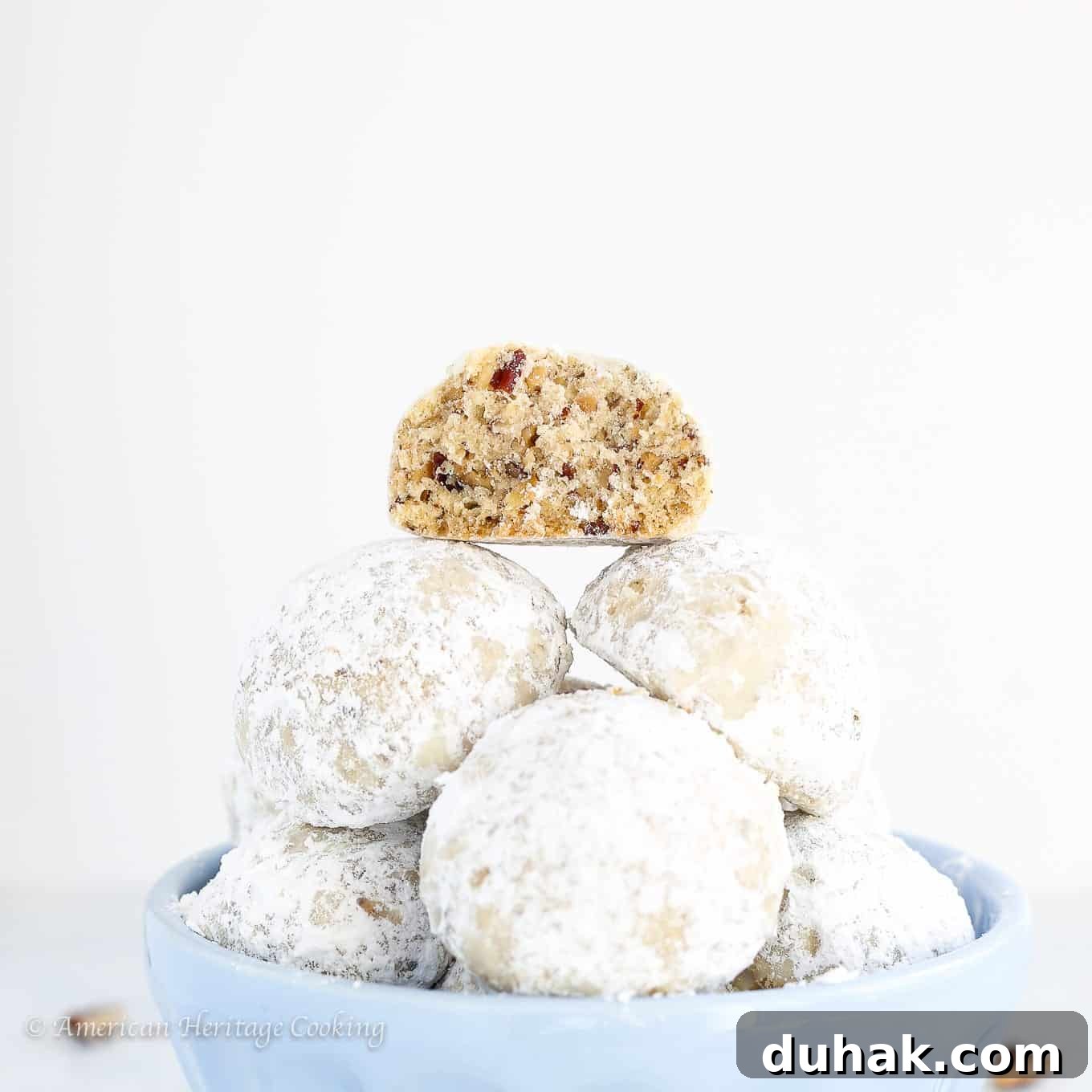 Mexican Wedding Cookies Recipe — Classic Crescent Cookies Guide 4 Mexican wedding cookies showing crumbly inside.