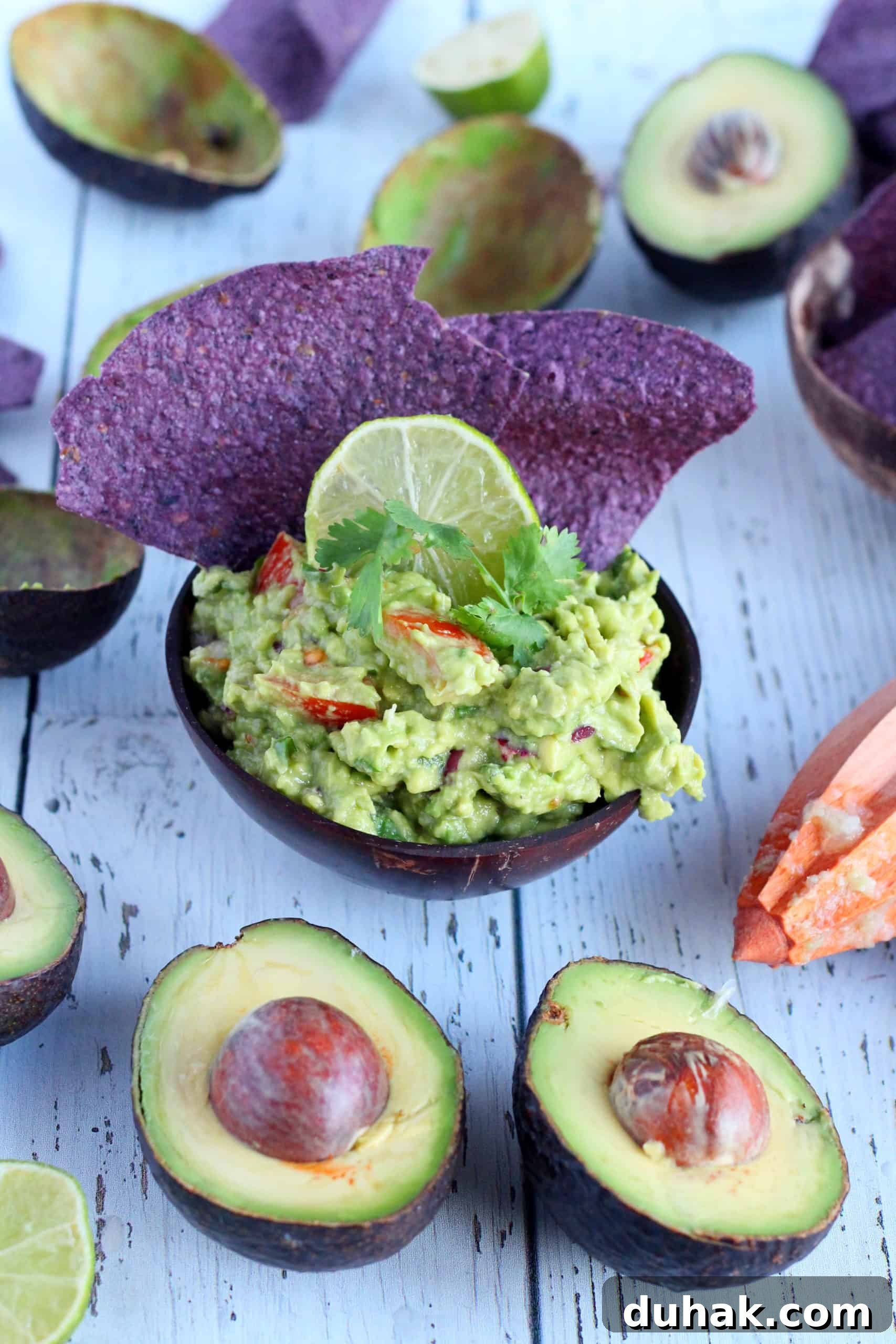 Guaranteed Ultimate Guacamole Recipe You’ll Love 3 Best guacamole dip in bowl with tortilla chips