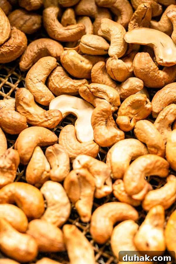 Cashew nuts roasted in an Air Fryer without oil in less than 10 minutes. Golden brown and crunchy. Serve as a snack or use in your recipes.