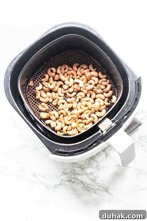 Crunchy cashews roasted in an Air Fryer. They are made in less than 10 minutes and can be stored for a long time.